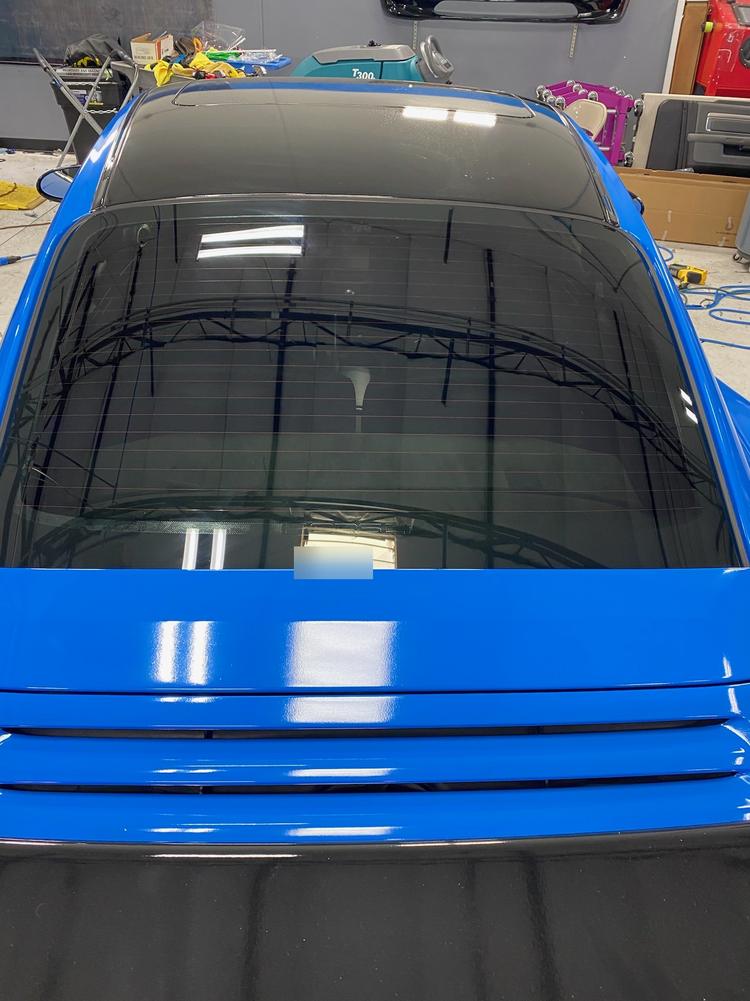 Blue Porsche — Top View